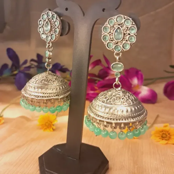 German silver jhumka with light green Kundan for Navratri party and daily wear Ethnic German silver jhumka with light green Kundan for party wear lehenga and suits