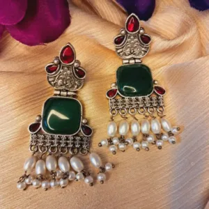 Oxidized German silver earrings with emerald green Monalisa stone and hanging pearl for Navratri Lightweight oxidized silver earrings with green Monalisa stone and pearl drop for party and daily wear