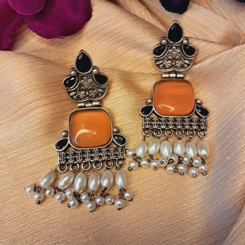 20250808_140906 Oxidized German silver earrings with topaz yellow Monalisa stone and hanging pearl for Navratri Beautiful oxidized German silver earrings with topaz Monalisa stone and pearl for Navratri outfit Beautiful oxidized German silver earrings with topaz Monalisa stone and pearl for Navratri outfit